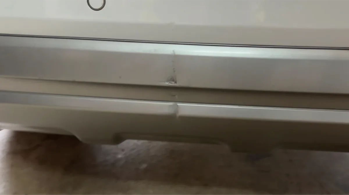 Car damage before repair - Audi Rear Bumper Scratch Repair before professional scratch repair service