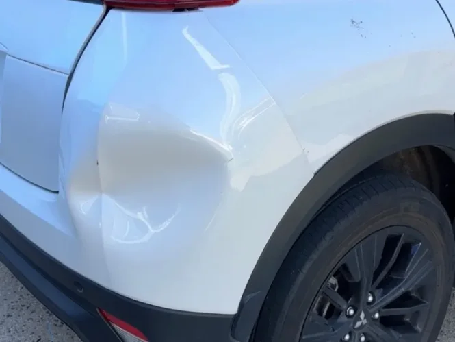 Bumper dent repaired in Wallan — before