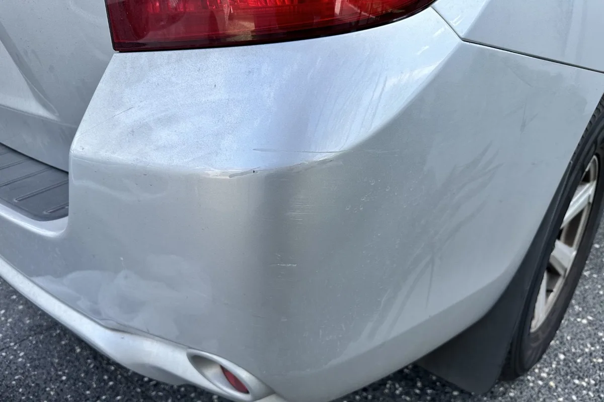 Toyota Prado rear bumper scuff repaired in Greenvale — before