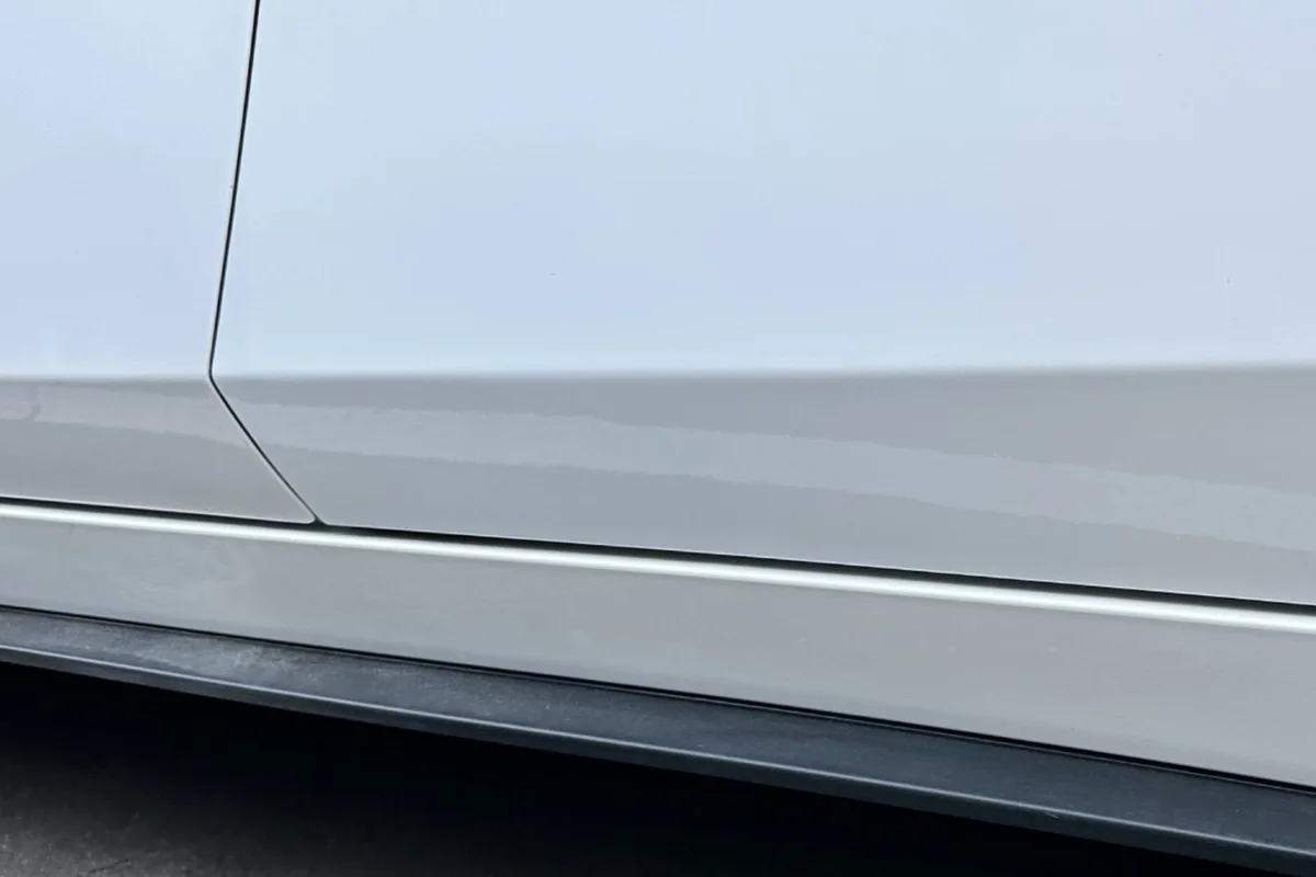 Door crease dent repaired in Doreen — after