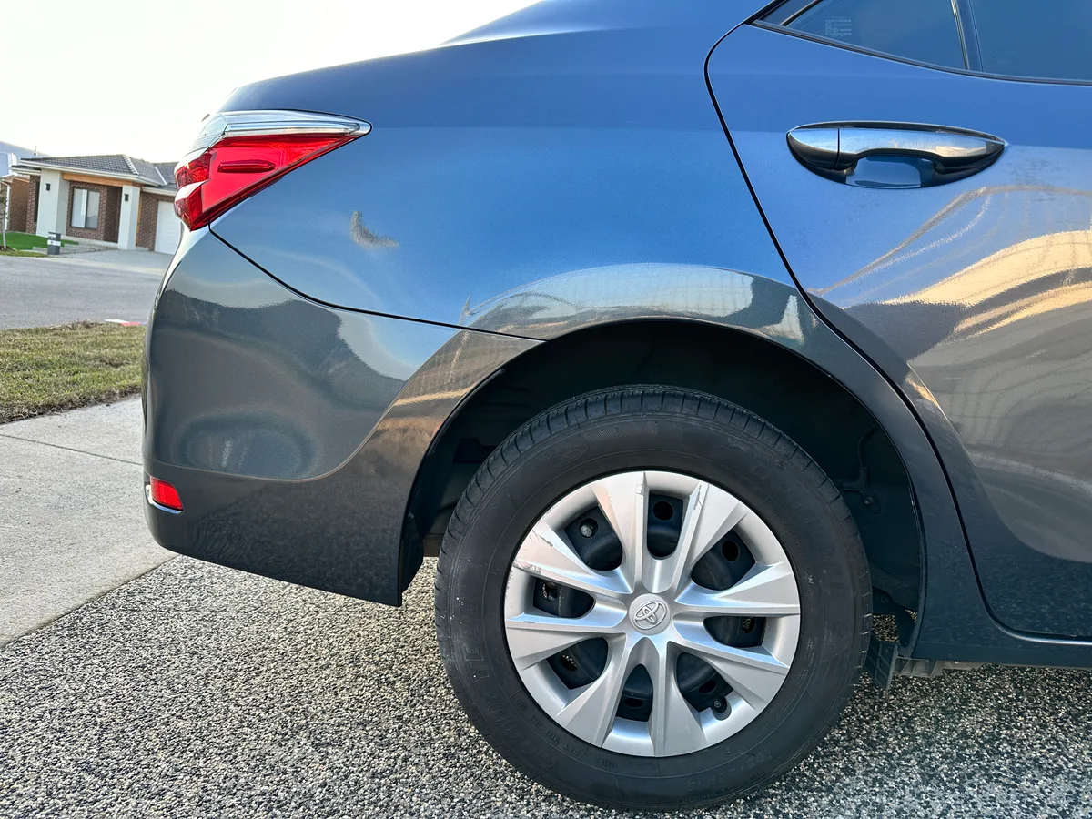 Professional car repair result - Rear Quarter Panel Dent Repair after expert repair by Melbourne Scratch Repairs