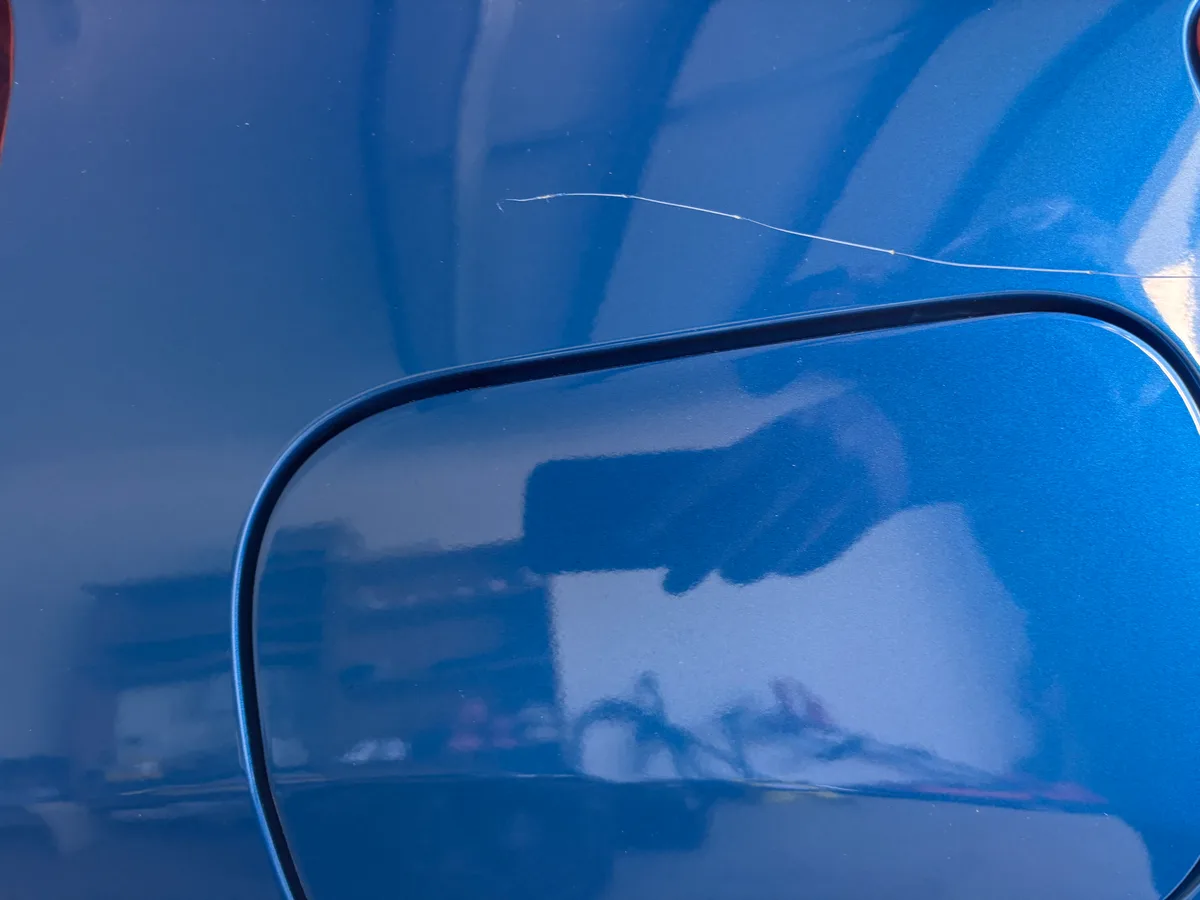 Keyed car panel repaired in Roxburgh Park — before