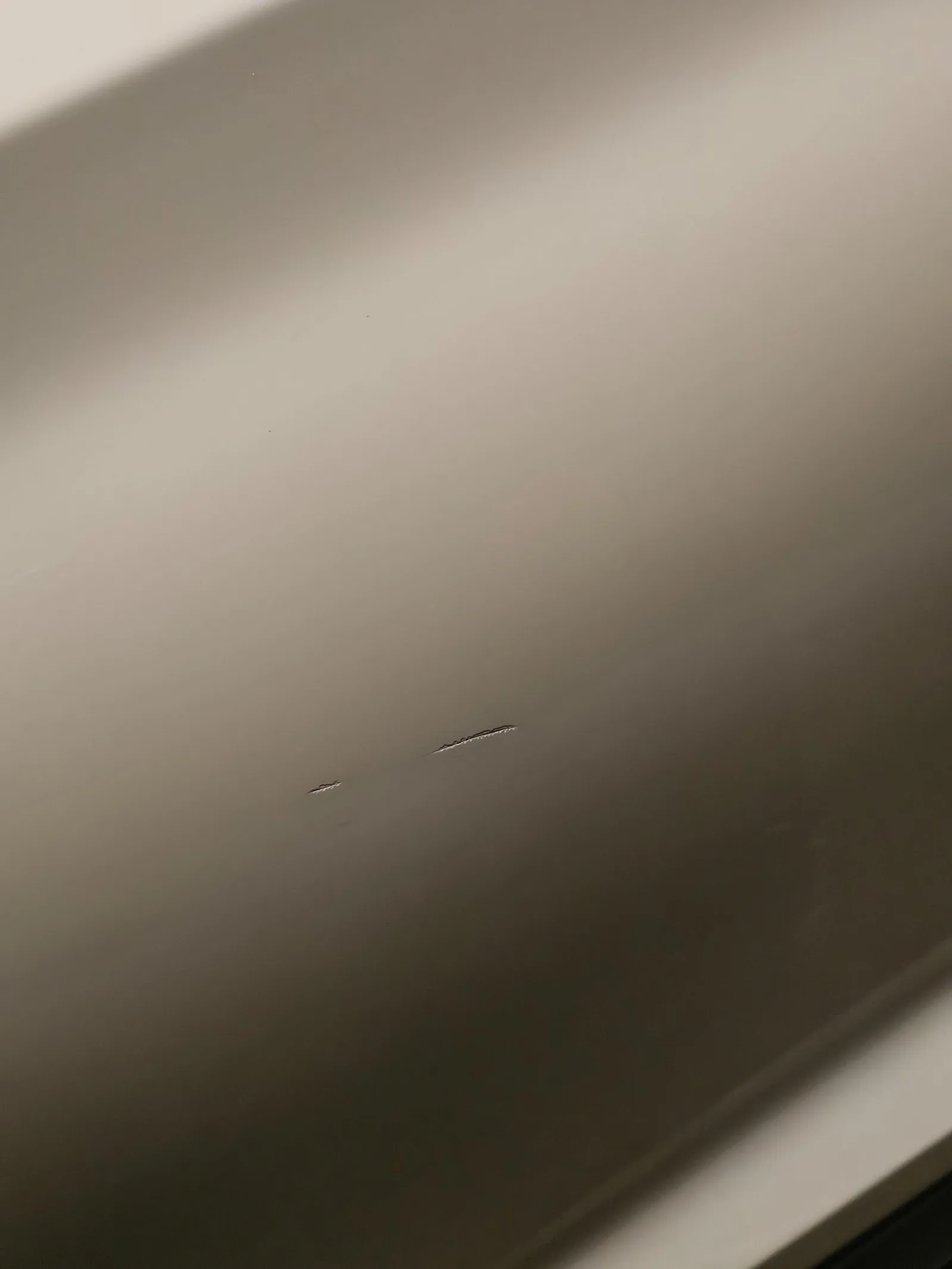 Keyed passenger door on a Hyundai Tucson repaired in Epping — before