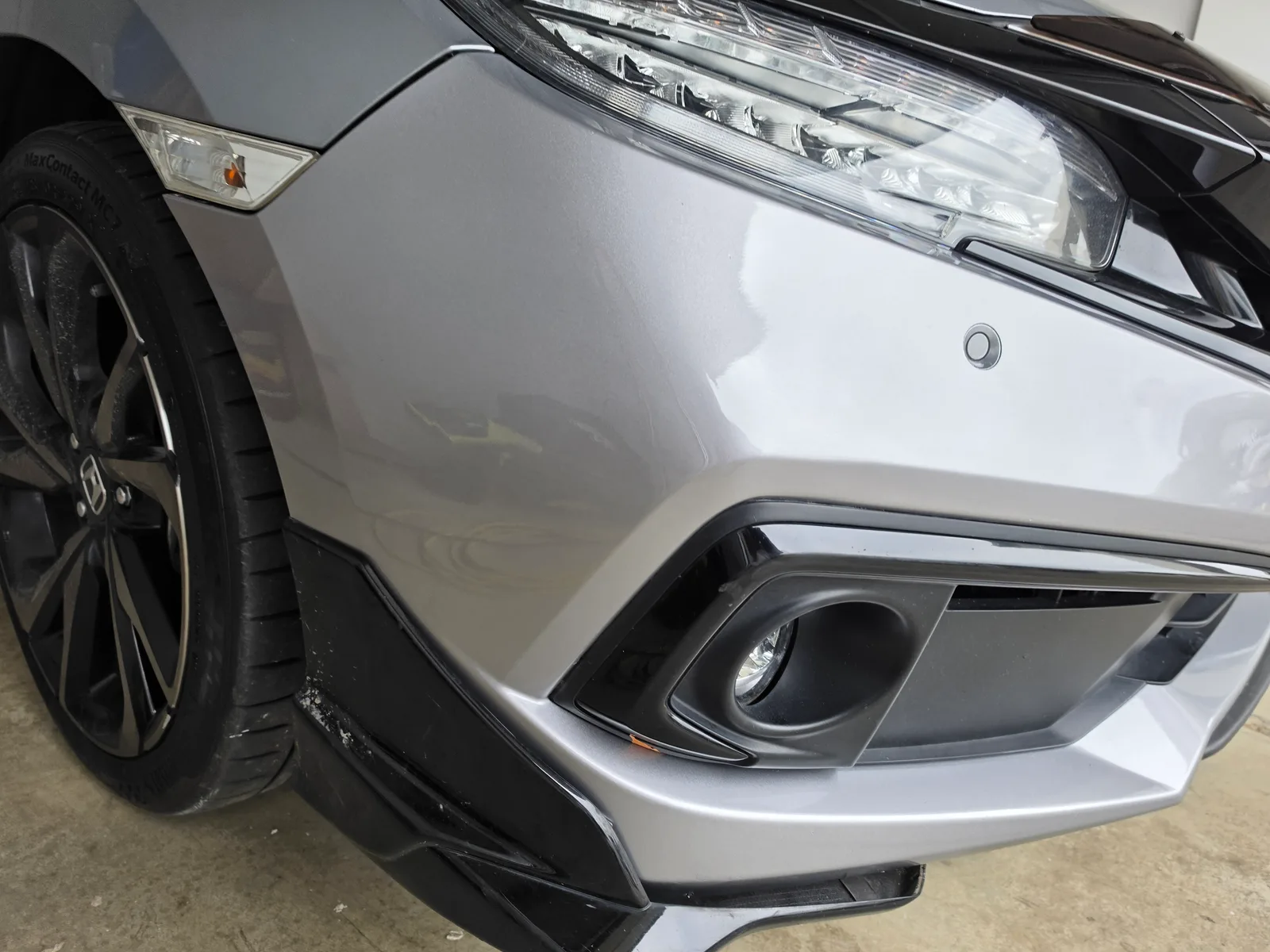 Professional car repair result - Scratched front bumper on a 2020 Honda Civic repaired in Mickleham after expert repair by Melbourne Scratch Repairs